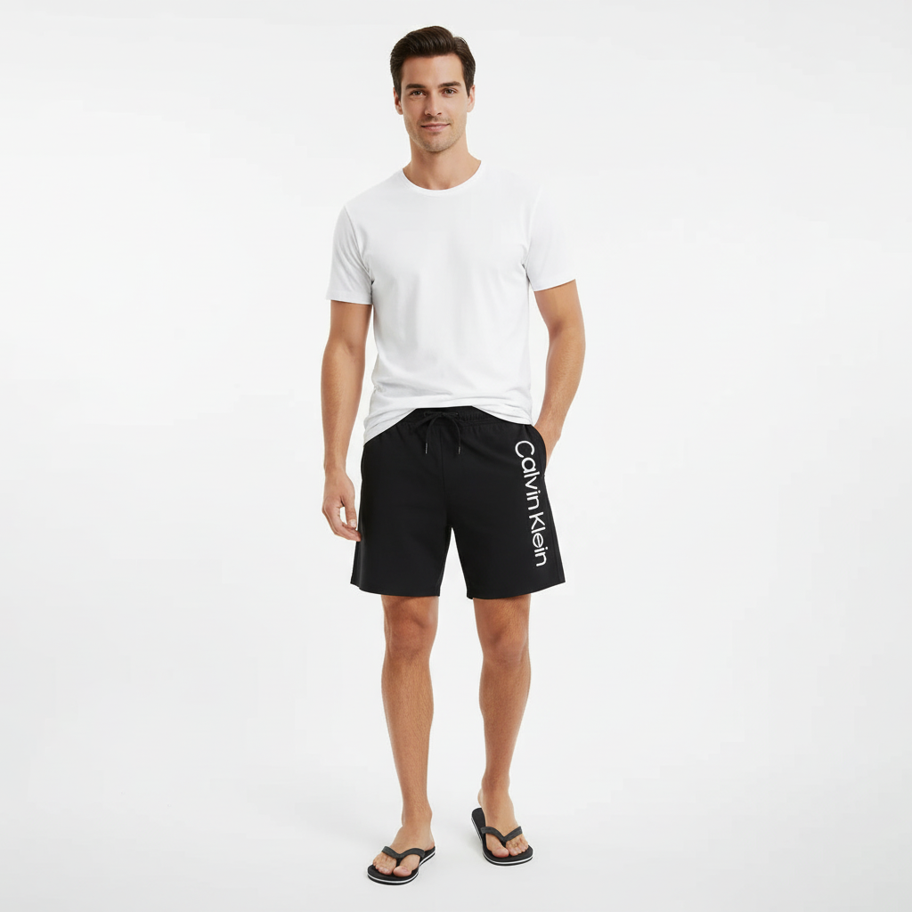 CALVIN KLEIN MEN BOARD SHORT INFINITE STRETCH SOLID LOGO 1 CALVIN KLEIN MEN BOARD SHORT INFINITE STRETCH SOLID LOGO